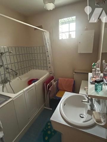 Une maison individuelle à usage d'habitation située à OSNY (95520).