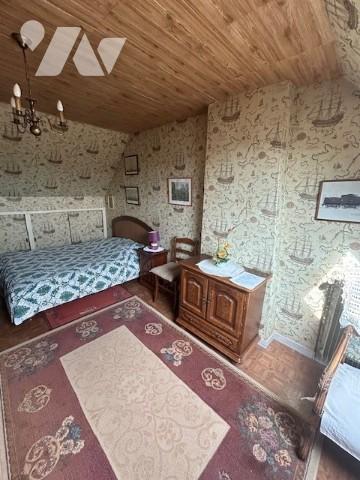 Une maison individuelle à usage d'habitation située à OSNY (95520).