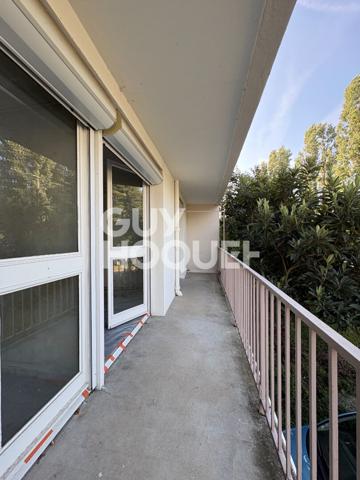 Spacieux T5 à rénover de 105,51 m² avec balcons et cave