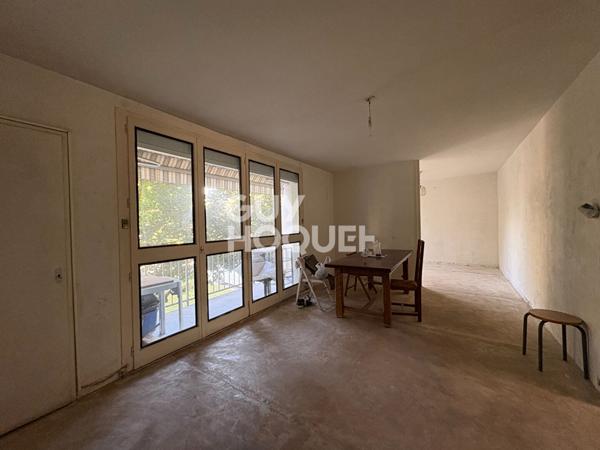 Spacieux T5 à rénover de 105,51 m² avec balcons et cave