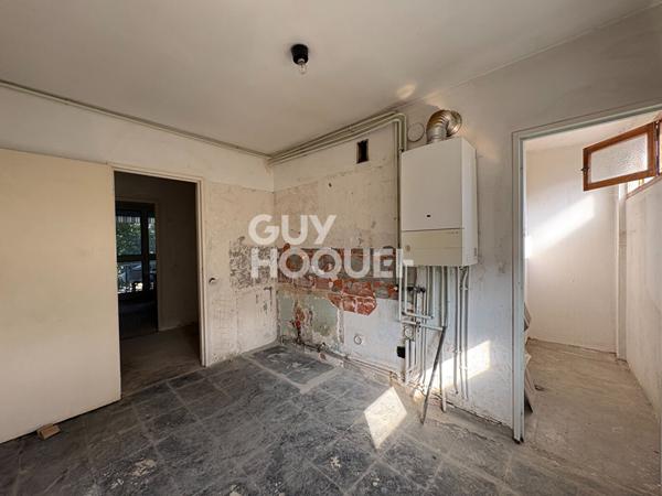 Spacieux T5 à rénover de 105,51 m² avec balcons et cave