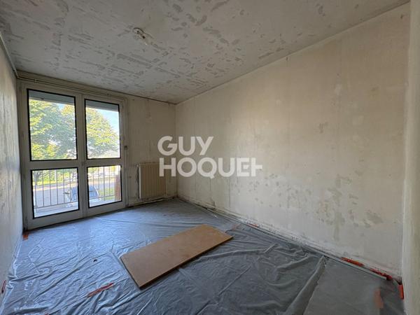 Spacieux T5 à rénover de 105,51 m² avec balcons et cave