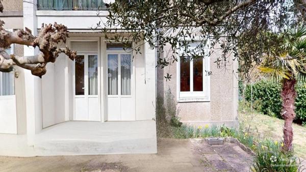 Appartement Rdc avec jardin, garage et dépendance