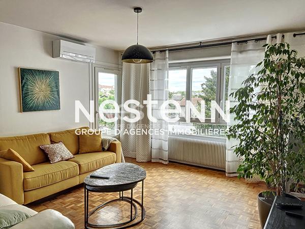Appartement Traversant 4 Pièces avec Balcon Parking et Cave - 69500 BRON