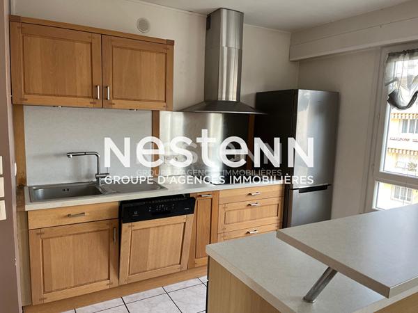 Appartement Traversant 4 Pièces avec Balcon Parking et Cave - 69500 BRON