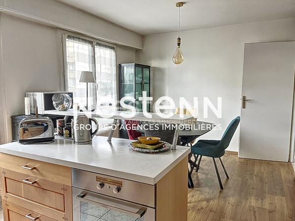 Appartement Traversant 4 Pièces avec Balcon Parking et Cave - 69500 BRON