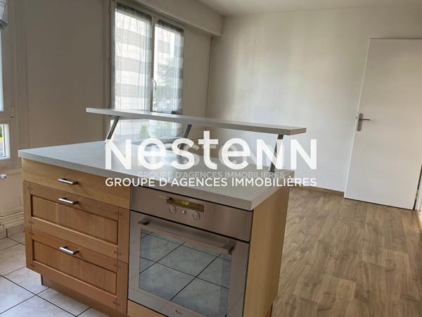 Appartement Traversant 4 Pièces avec Balcon Parking et Cave - 69500 BRON