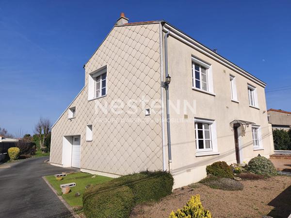 A vendre - Maison avec quatre chambres, jardin, deux garages - 100m² - Lys-Haut-Layon - D6006