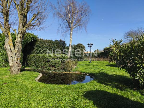 A vendre - Maison avec quatre chambres, jardin, deux garages - 100m² - Lys-Haut-Layon - D6006