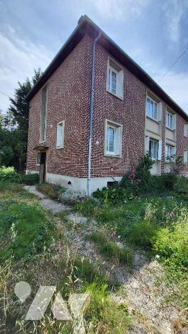 Maison de ville dans un quartier résidentiel à deux pas des commerces sur 403 m²