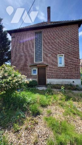 Maison de ville dans un quartier résidentiel à deux pas des commerces sur 403 m²