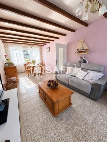 Maison 94 M2 avec 3 chambres, garage et jardin.