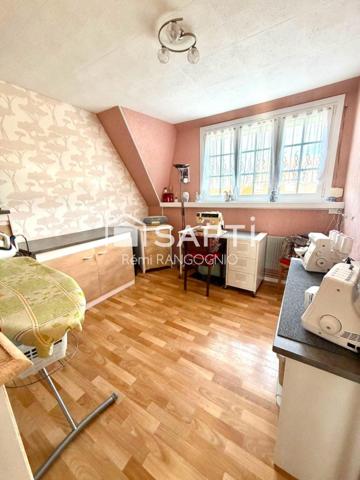 Maison 94 M2 avec 3 chambres, garage et jardin.