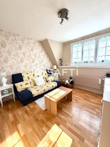 Maison 94 M2 avec 3 chambres, garage et jardin.