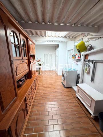 Maison 94 M2 avec 3 chambres, garage et jardin.