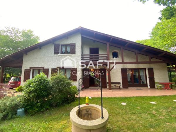 Maison traditionnelle avec grand jardin