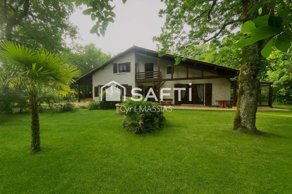 Maison traditionnelle avec grand jardin