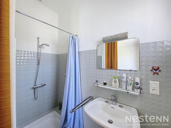 A Vendre Maison de caractère en pierre de 317 m² avec grand garage et jardin arboré à Condom.