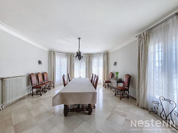 A Vendre Maison de caractère en pierre de 317 m² avec grand garage et jardin arboré à Condom.