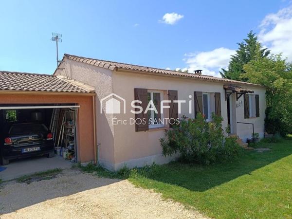 Maison plein pied ,terrain arboré,garage ,parking