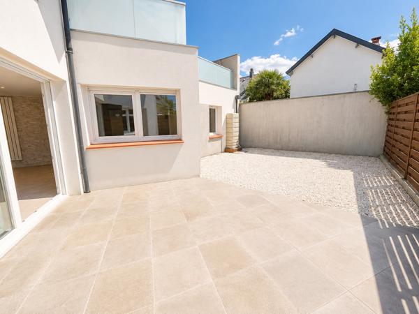 Appartement 88 m2 3 chambres AURAY avec jardin / 2 places de stationnement
