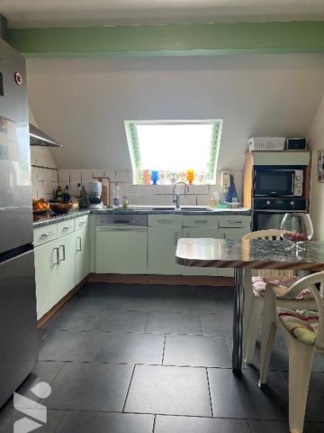 Appartement T4 95 m²  avec vue montagnes, cave, place de parking et garage sur BAGNERES DE BIGORRE.