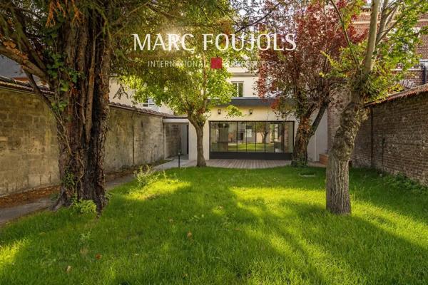 Maison familiale entièrement rénovée triangle d’or