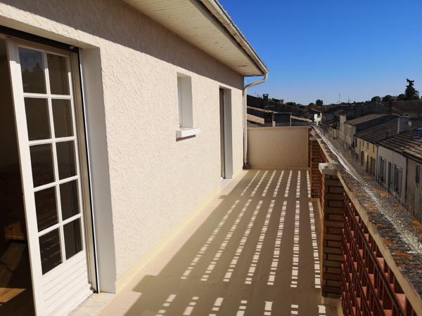 MAISON DE VILLE AVEC TERRASSES ET GRAND GARAGE