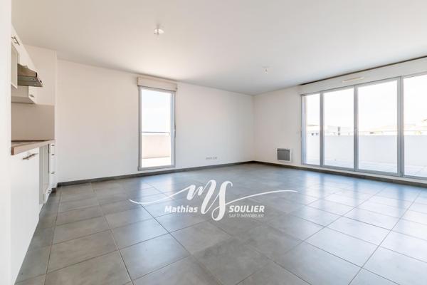 T3 de 64 m² avec terrasse de 46 m² et garage fermé
