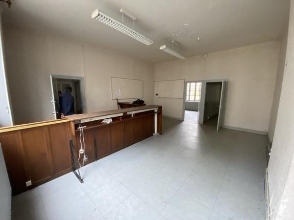 Maison de ville à rénover avec garage et jardin !