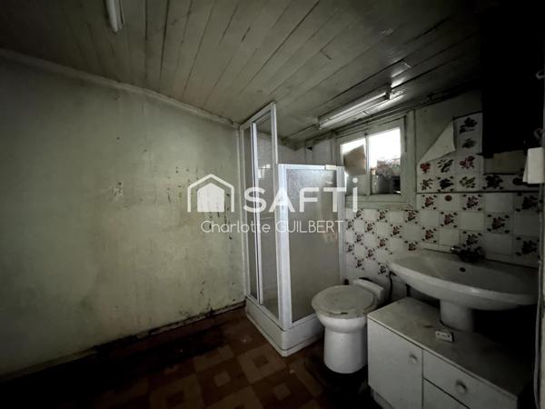 Maison de ville à restaurer entièrement