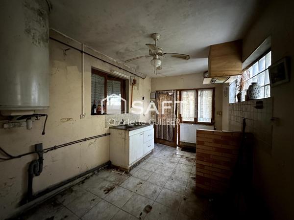 Maison de ville à restaurer entièrement