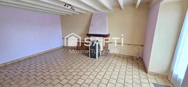 Maison 115m², 2/3chambres, 400m² de terrain avec garage.