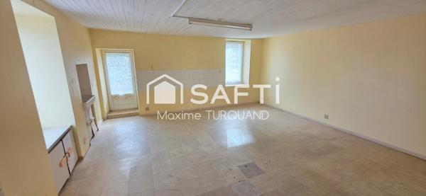 Maison 115m², 2/3chambres, 400m² de terrain avec garage.
