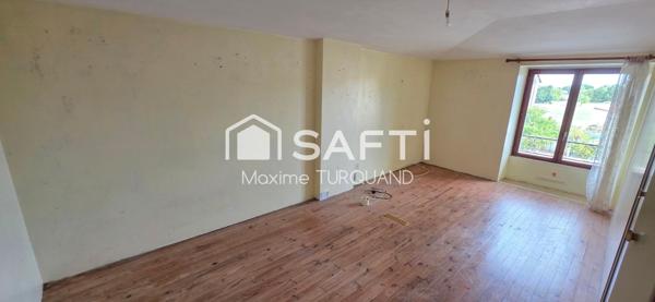 Maison 115m², 2/3chambres, 400m² de terrain avec garage.