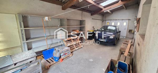 Maison 115m², 2/3chambres, 400m² de terrain avec garage.