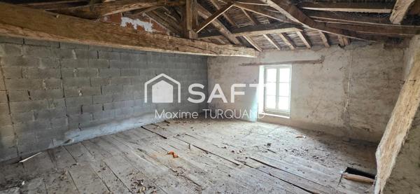 Maison 115m², 2/3chambres, 400m² de terrain avec garage.