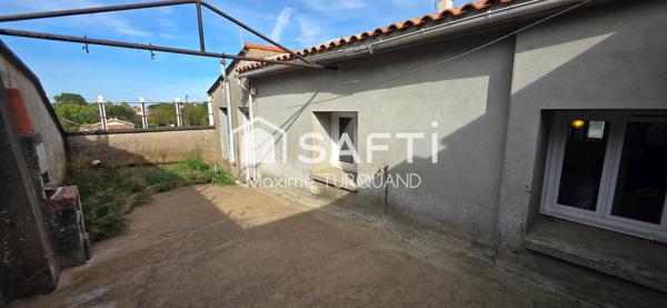 Maison 115m², 2/3chambres, 400m² de terrain avec garage.