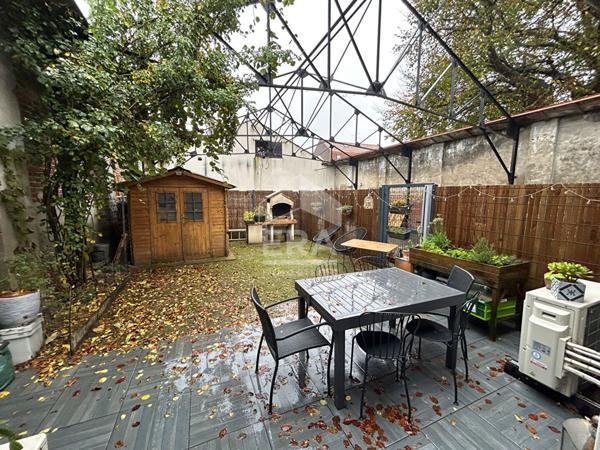 Maison DPE B esprit loft avec jardin et 3 places de parking