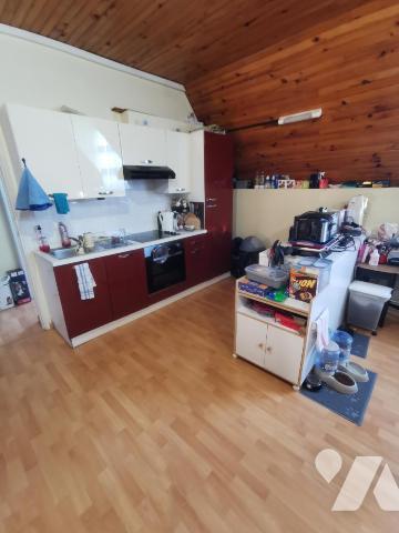 Bel immeuble de rapport composé d'un rez-de-chaussée professionnel et de trois appartements