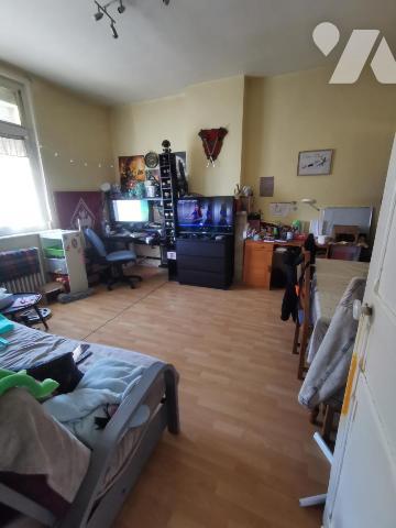 Bel immeuble de rapport composé d'un rez-de-chaussée professionnel et de trois appartements