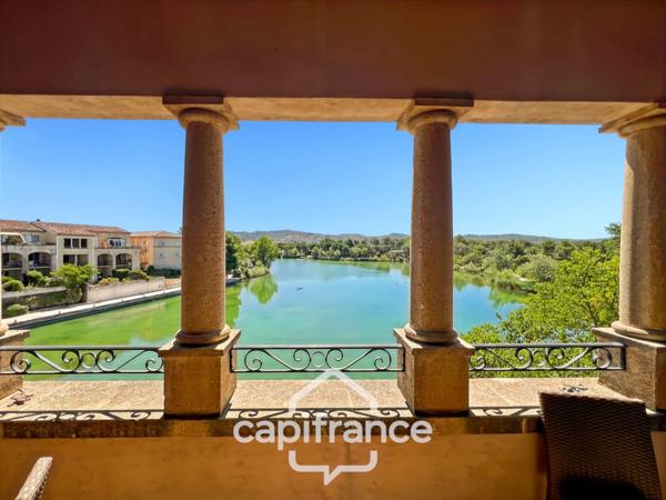 DERNIER ETAGE EN ANGLE CLIMATISE avec VUE PANORAMIQUE SUR LE LAC, BELLE EXPOSITION,appartement de 35 m2 , 2 chambres place de parking, cave et local vélos