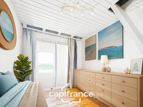 DERNIER ETAGE EN ANGLE CLIMATISE avec VUE PANORAMIQUE SUR LE LAC, BELLE EXPOSITION,appartement de 35 m2 , 2 chambres place de parking, cave et local vélos