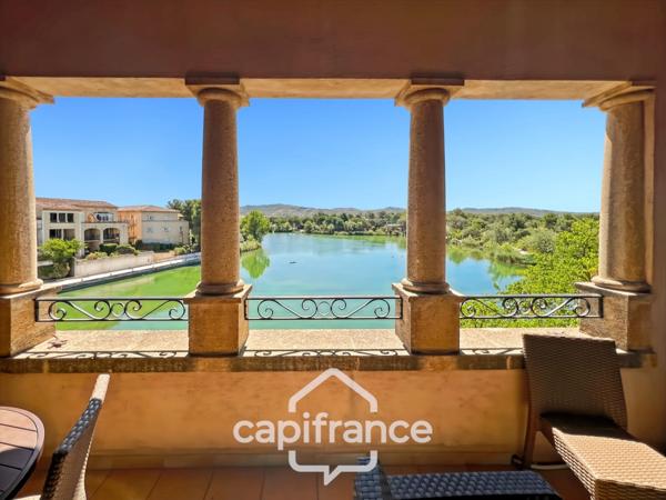 DERNIER ETAGE EN ANGLE CLIMATISE avec VUE PANORAMIQUE SUR LE LAC, BELLE EXPOSITION,appartement de 35 m2 , 2 chambres place de parking, cave et local vélos