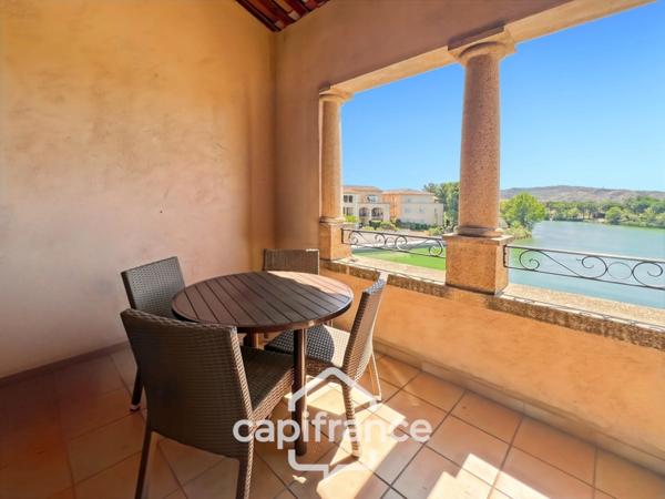 DERNIER ETAGE EN ANGLE CLIMATISE avec VUE PANORAMIQUE SUR LE LAC, BELLE EXPOSITION,appartement de 35 m2 , 2 chambres place de parking, cave et local vélos