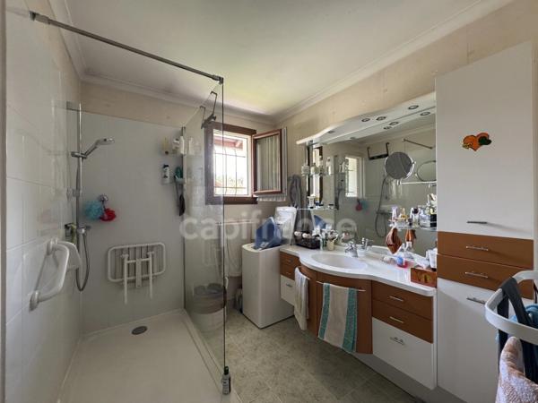 DOUSSARD Terrain 2024m² divisble constructible avec maison construite