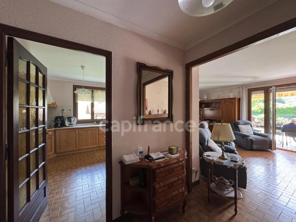 DOUSSARD Terrain 2024m² divisble constructible avec maison construite