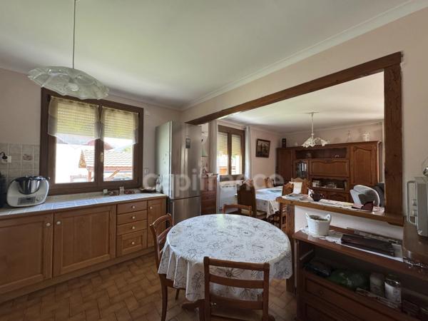 DOUSSARD Terrain 2024m² divisble constructible avec maison construite