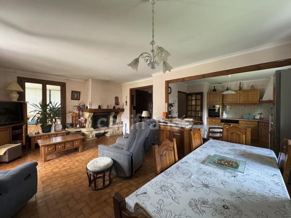 DOUSSARD Terrain 2024m² divisble constructible avec maison construite