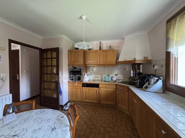 DOUSSARD Terrain 2024m² divisble constructible avec maison construite